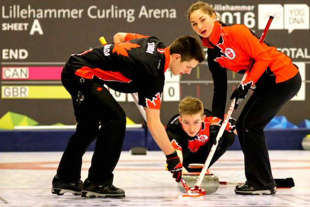 Sweepers Tyler Tardi and Karlee Burgess take charge of Sterling Middleton’s rock on the way to a 4-2 win over Great Britain at the 2016 Youth Olympic Games (WCF/Richard Gray photo)